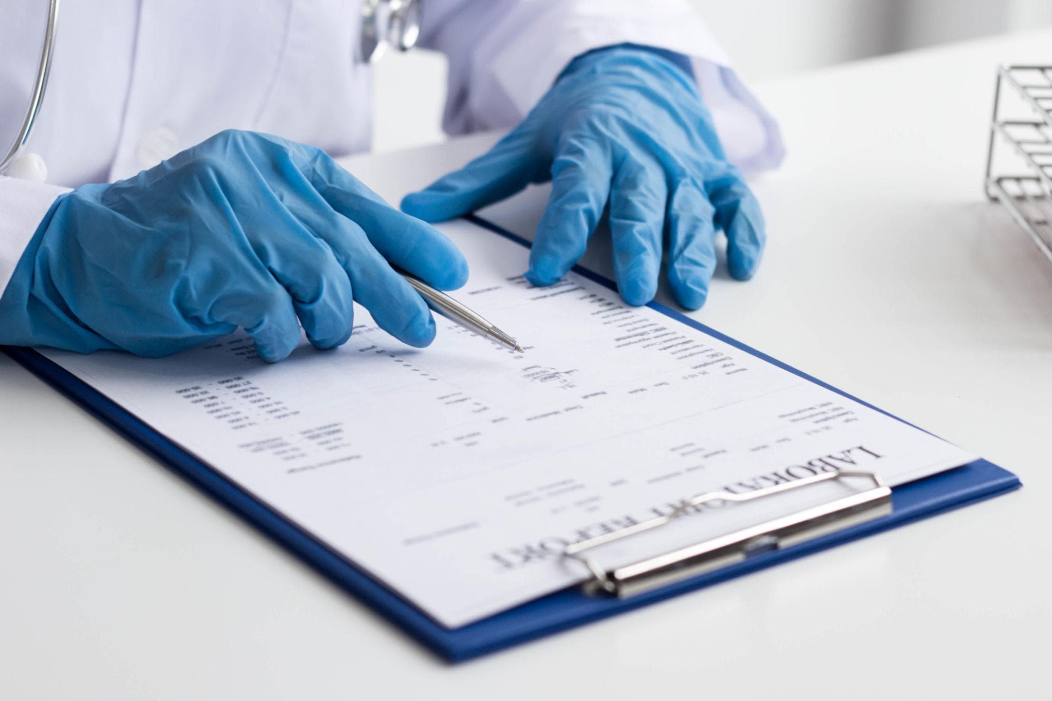 Doctor reviewing laboratory test results with a patient
